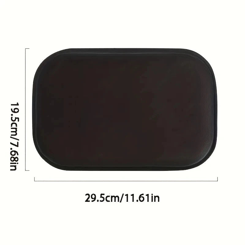 A rectangular, dark brown plush car armrest cushion with dimensions of 19.5cm x 29.5cm.