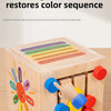 A wooden sorting toy with colored rods and shapes used to restore a color sequence.