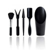A set of black succulent and bonsai gardening tools including a brush, tweezers, and a spoon.