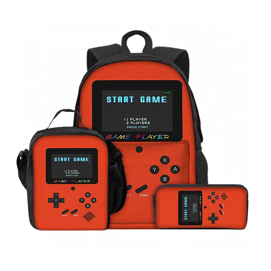 Orange 3-piece kids gaming console backpack set including a backpack, lunch bag, and pencil case