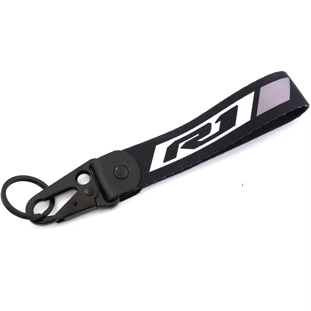 Black and grey brake fluid reservoir cover sock for Yamaha R1 R6 motorcycle.