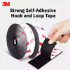 Roll of strong self-adhesive hook and loop tape being held by a hand