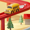 A yellow train car is shown on a red track, with green trees and a blue rocket car in the foreground.