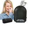 A woman is shown reacting to a fart machine, with the remote control device next to it.