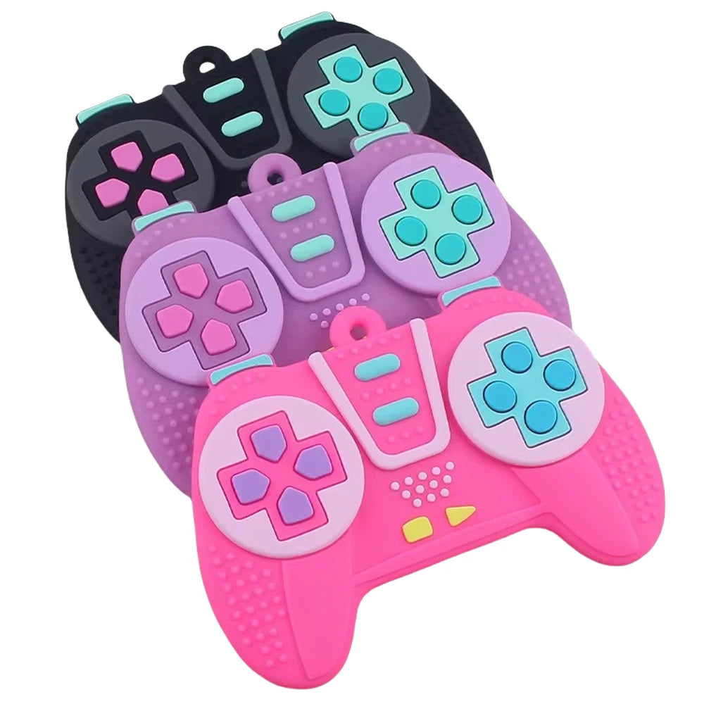 A set of silicone game controllers in purple and pink colors for baby teethering