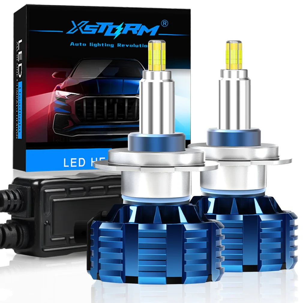 A box and three XSTORM H7 LED headlight bulbs with blue and silver components are displayed.