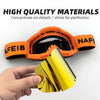 A hand holds a bright yellow professional MX off-road goggle lens against an orange frame.