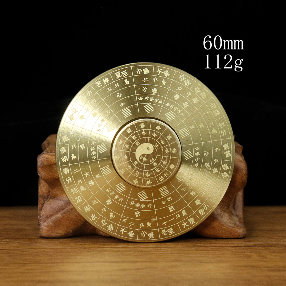 Solid brass Feng Shui compass with Yin Yang and eight trigrams, measuring 60mm and weighing 112g.