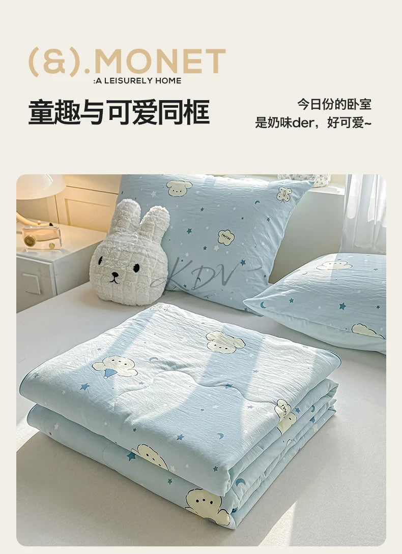 Light blue bedding featuring a pastoral print with white clouds and sheep motifs.