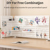 A white desktop pegboard organizer with shelves and hooks displaying various accessories for a personalized space.