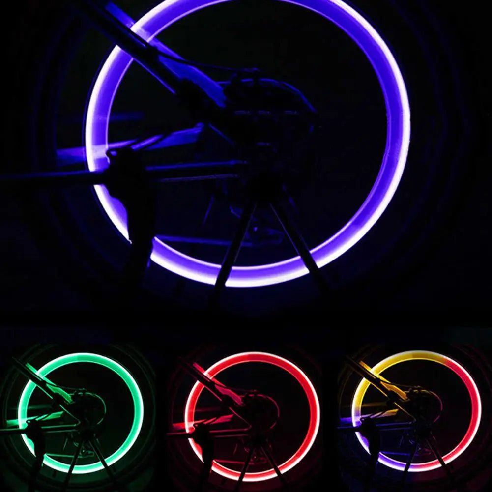 A series of motion-activated LED tire valve lights showing different colors including blue, green, red, and yellow rings.