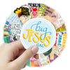 A hand holds a circular sticker pack featuring inspirational Bible verses and Christian decals.