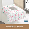 Pink and green patterned disposable toilet seat covers displayed on a white toilet seat.