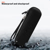 Black waterproof and shockproof travel case for a toothbrush shown against a dark, wet surface.