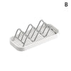 A white W-shaped stainless steel soap holder with a drainage tray.