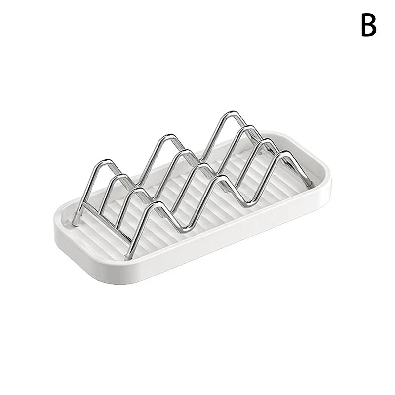 A white W-shaped stainless steel soap holder with a drainage tray.
