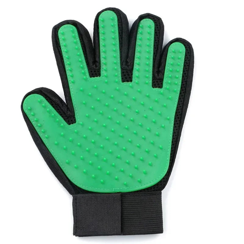 A bright green silicone pet grooming glove with a black cuff and textured fingertips for hair removal.