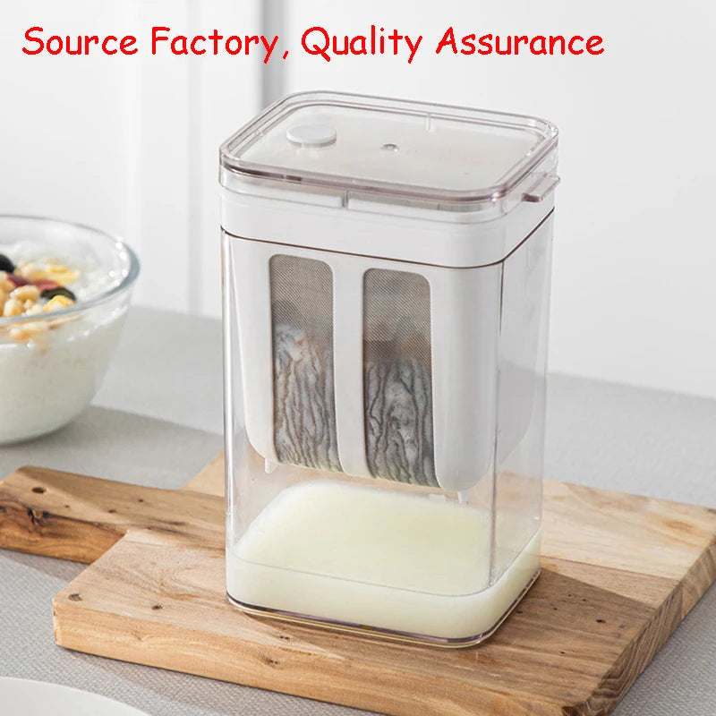 A clear plastic yogurt strainer with a fine mesh filter is shown over a wooden cutting board.