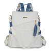 A white vegan leather backpack with blue accents and a laptop compartment.