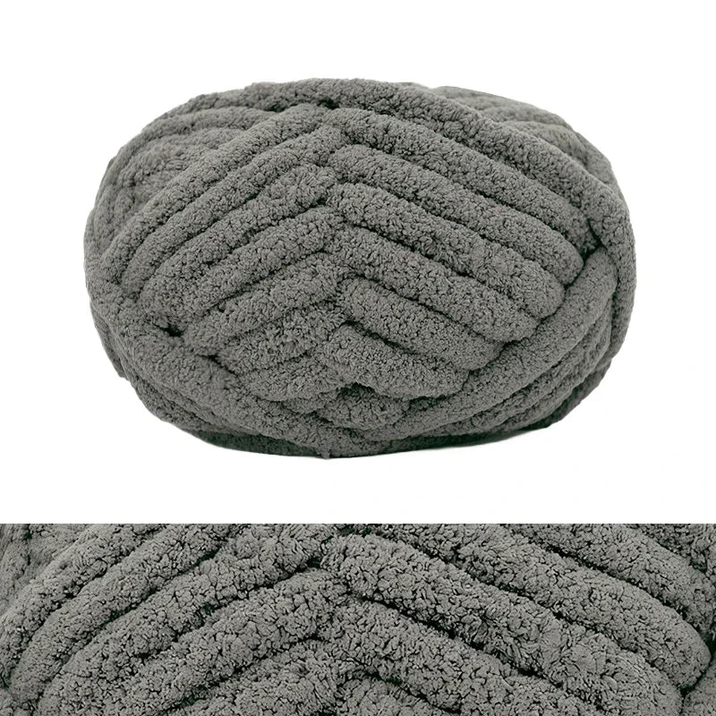 A ball of gray chunky chenille yarn used for hand knitting and crochet