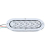 A silver oval LED trailer tail light with a dynamic amber arrow turn signal.