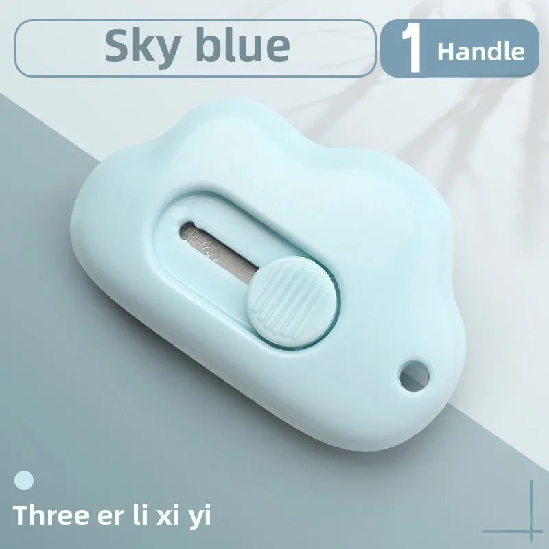 Light blue cloud-shaped retractable letter opener with a handle and keychain loop.