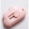 A pink compact rabbit mini cutter with a retractable blade is shown against a white background.