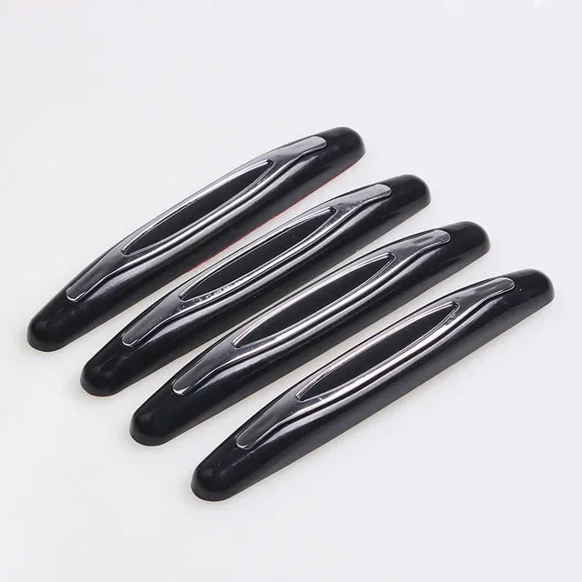 A pack of four black car door edge protector strips shown diagonally on a white background.