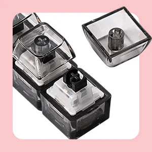 A black LED clickable fidget keychain with a keyboard design shown in various views.