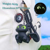 A black Toothless dragon ornament with movable wings attached to a keychain on a white shirt.