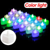 A collection of heart-shaped flameless LED candles glowing in various colors on a black background.