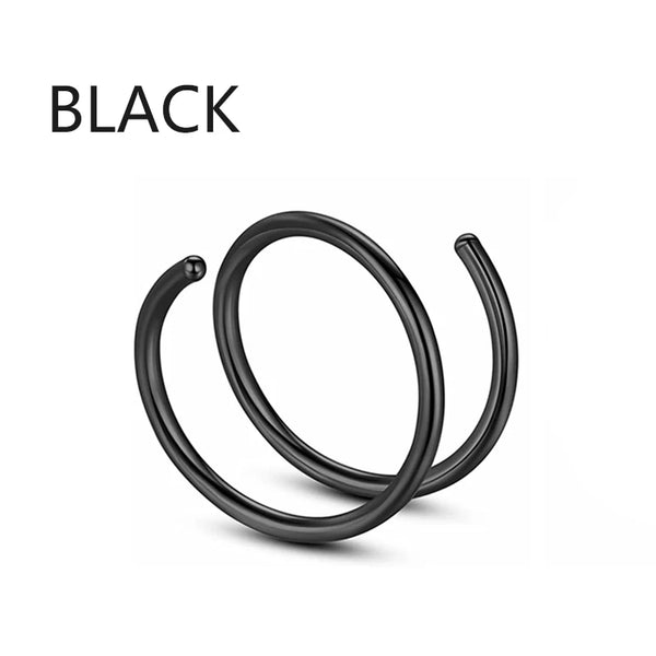 A black non-piercing magnetic septum ring shown in a close-up view.