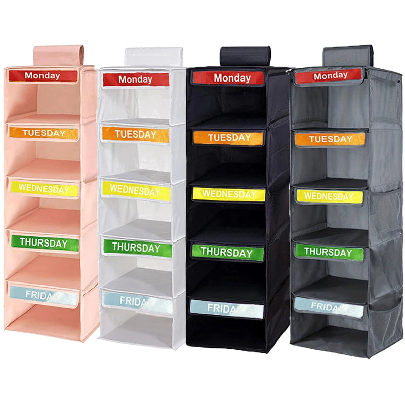 A set of five-layer hanging closet organizers with labeled daily pockets for weekly organization.