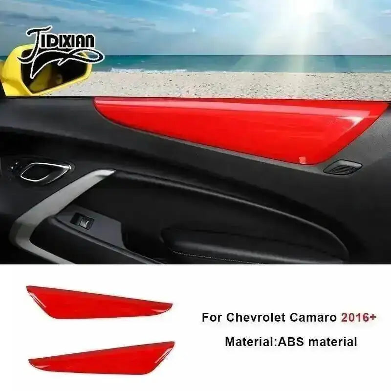 Red interior and exterior trim kit for Chevrolet Camaro featuring a bright red accent piece.