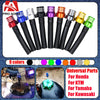 A collection of nine colored motorcycle one-way fuel tank breather valves for Honda, KTM, Yamaha, and Kawasaki.