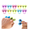 A set of 100 fun eye finger puppet rings in various colors and sizes displayed on a hand.