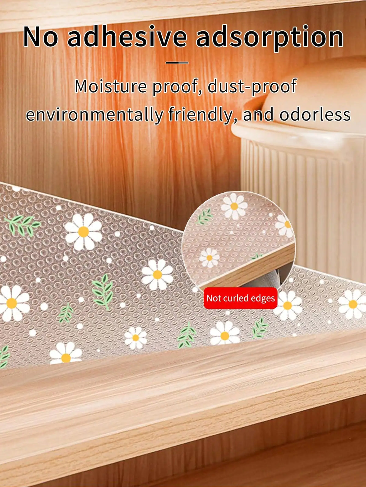 A white and green floral patterned kitchen drawer mat shown in a wooden cabinet setting.