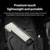 A silver Lexar 128GB flash drive is shown resting inside a dark fabric pouch.