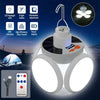 A white foldable solar camping lantern with multiple light modes and USB charging features is shown alongside its remote cont