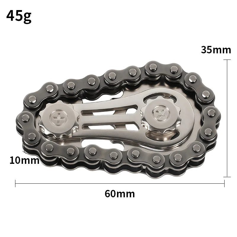 A silver metal sprocket fidget spinner with a 60mm diameter and 35mm thickness, weighing 45g.