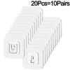 A set of twenty white invisible adhesive hooks packaged for sale.