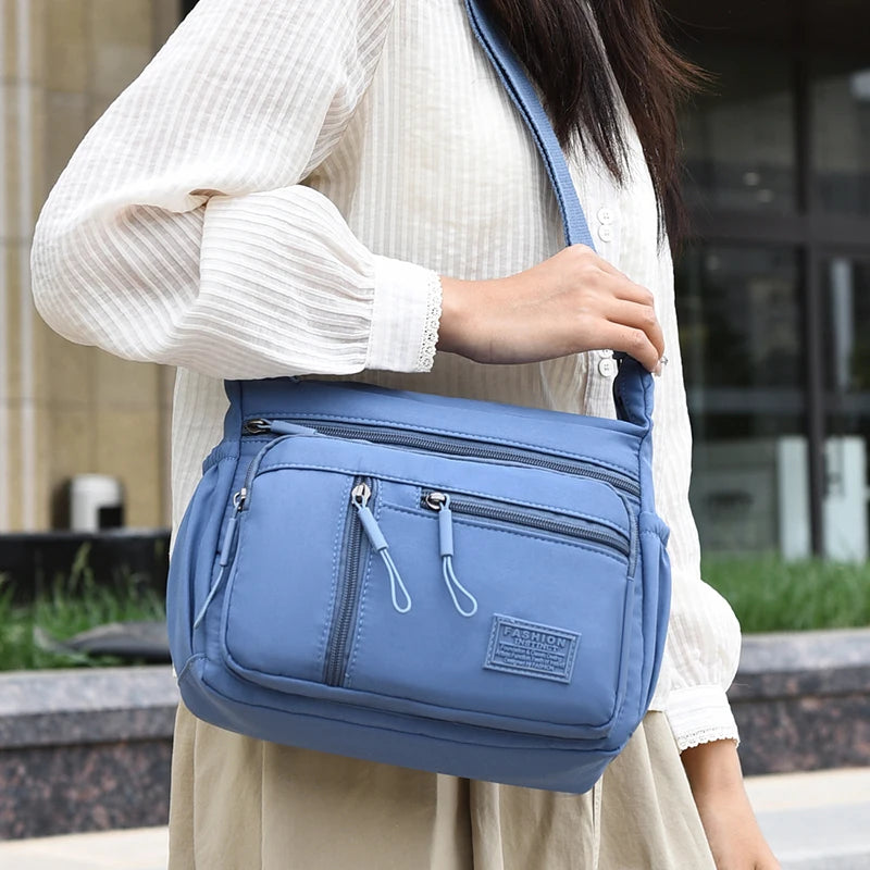 Bolso bandolera de nylon impermeable con múltiples bolsillos