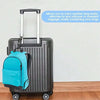 A black rolling suitcase with a bright blue fabric bag attached to the handle.