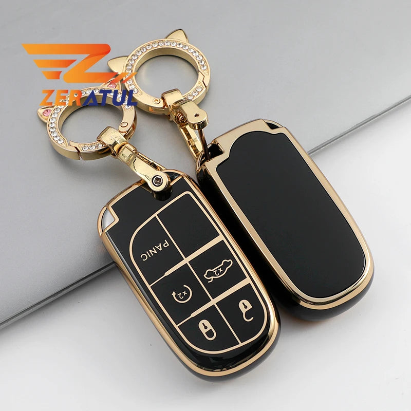 A gold-toned key ring with a black TPU car key case cover featuring various key cutouts.