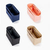 Three felt purse organizer inserts in navy blue, peach, and beige colors shown from the side.
