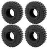 Four black monster truck tires for RC crawler cars