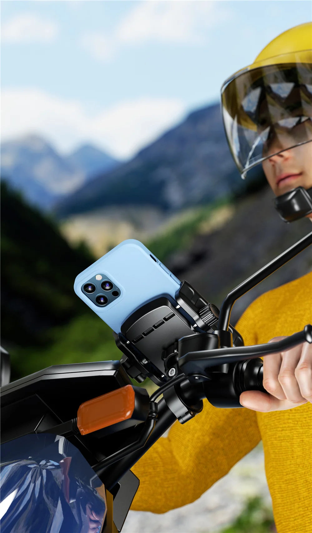 A person wearing a yellow jacket and helmet is using a quick-release motorcycle phone mount to attach a smartphone to their b