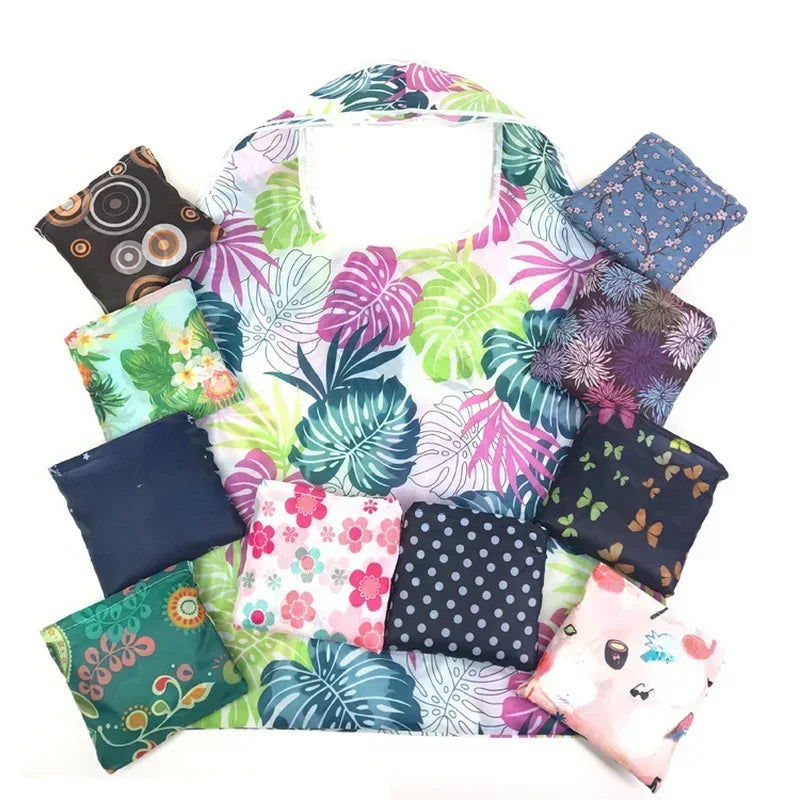A colorful foldable floral shopping tote with multiple patterned fabric pouches.