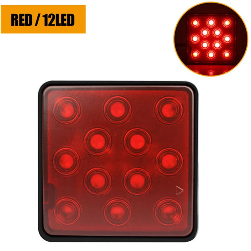A rectangular red LED trailer tail light with multiple circular lights for brake and running functions.