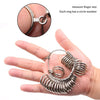 A hand holds a metal ring sizing gauge with multiple conical rings for measuring finger size.